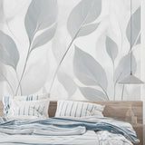 Grey botanical wallpaper styled in master bedroom with minimal furniture and natural light