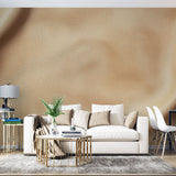 Beige leather textured wallpaper in modern living room showing rich surface detail and warm neutral tones
