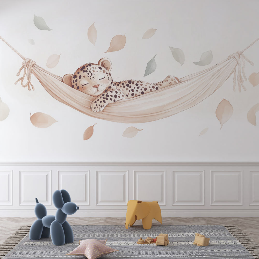 Baby Leopard Wallpaper creating a peaceful nursery atmosphere, shown in a bright modern children's room with natural decor