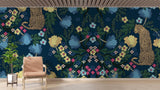 Leopard print wallpaper creating dramatic atmosphere in modern living room with deep blue walls and gold accents