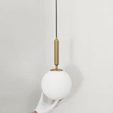 Modern Globe Pendant Light  Brass Cylinder Design - Product example