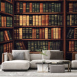 Library wallpaper mural styled in a cozy home office with leather chair and reading lamp creating an inviting study space