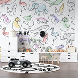 Line art animal wallpaper in bright nursery with white furniture showing pastel minimalist design