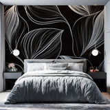 Black and white line art wallpaper with feather pattern creating depth in a modern living room setting