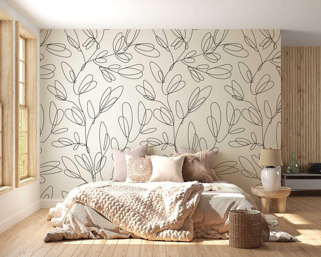Modern line art floral wallpaper creating a serene atmosphere in a bright Scandinavian living room setting