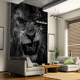 Black and white lion wallpaper with red eyes creating dramatic impact in modern living room setting