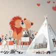 Lion couple wallpaper creating a sweet atmosphere in a modern nursery with coral and beige accents