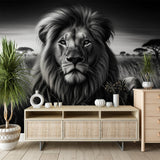 Black and white lion mural wallpaper creating a dramatic focal point in a modern living room with minimal furniture