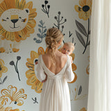 Safari lion wallpaper adding charm to a playroom with natural wood accents