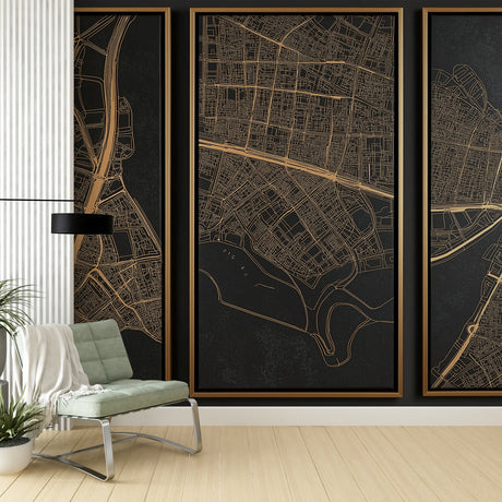 Black and gold city map wallpaper creating depth in a modern office space with minimal furniture
