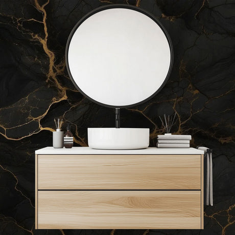 Black and gold marble wallpaper creating an elegant accent wall in a modern living room with soft lighting