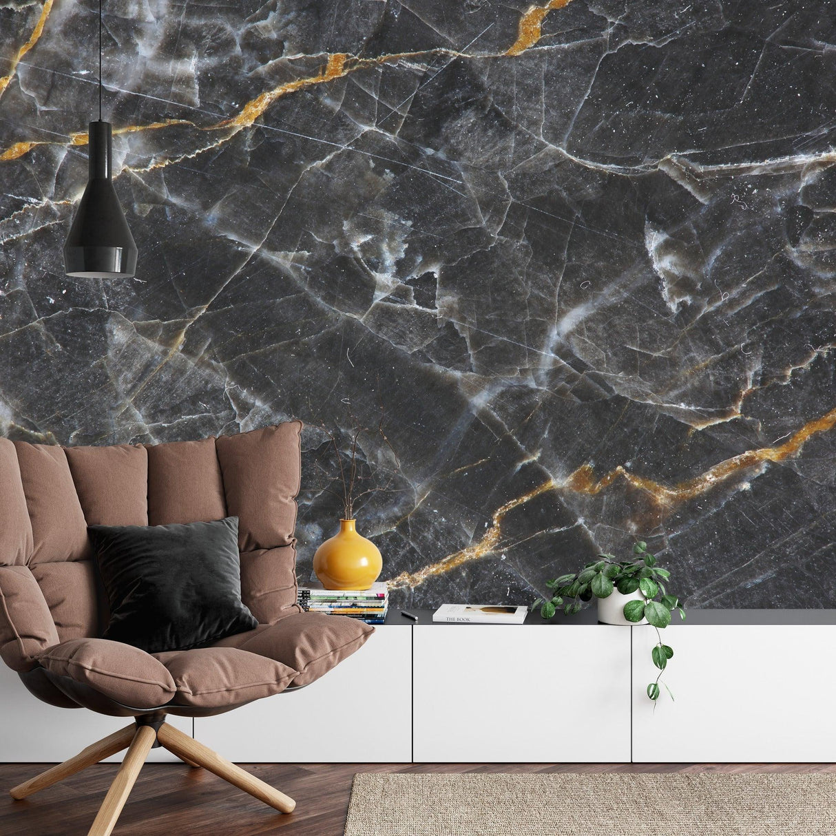 Black marble wallpaper with gold veins making a statement in an office space