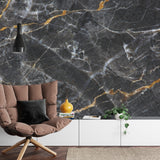 Black marble wallpaper with gold veins making a statement in an office space