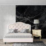 Black marble wallpaper mural in modern luxury living room with white furniture and natural lighting
