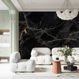 Master bathroom with dramatic black marble wallpaper creating spa-like atmosphere