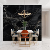 Home office space with black marble accent wall adding professional sophistication