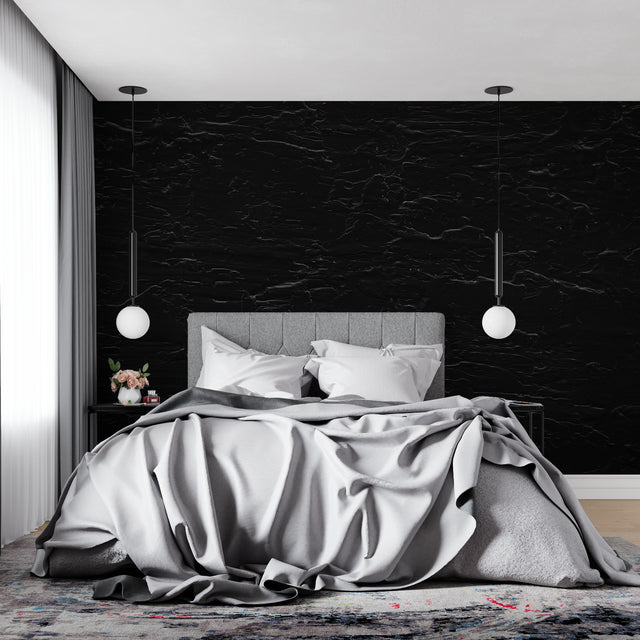 Black marble wallpaper in modern living room showing dramatic veining against dark background