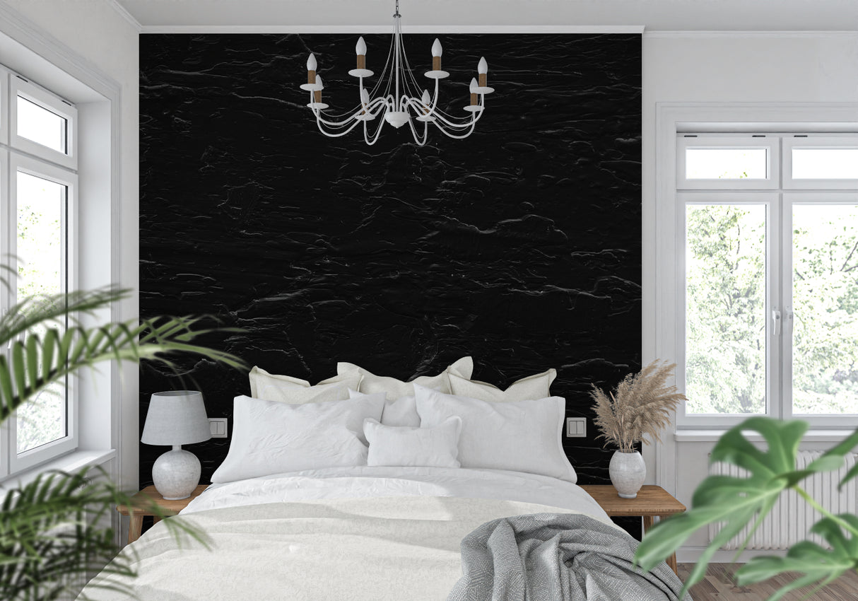 Elegant dining room featuring black stone wall mural with subtle grey streaks