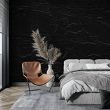 Bathroom interior with black marble wallpaper highlighting premium stone texture