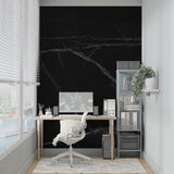 Black marble wallpaper with white veins in modern living room, adding luxury and depth to the space