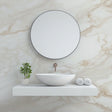 Marble effect wallpaper creating an elegant statement wall in a bright modern living room with beige and white veining