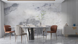 Elegant marble wall mural in a bright dining room setting with pendant lights