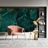 Emerald green marble wallpaper with gold leaves creating depth in modern living room setting