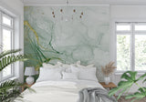 Dining room decorated with sage green and gold marble effect wallpaper