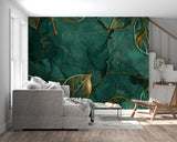 Luxury dining room featuring emerald marble wallpaper with gold leaf accents behind elegant furniture