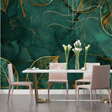Home office space with emerald marble wallpaper showing the intricate gold leaf pattern