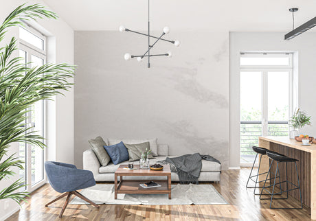 Modern marble wallpaper in a bright living room creating an elegant backdrop for minimalist furniture