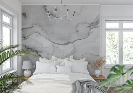 Modern grey marble wallpaper in bright living room with minimal furniture