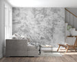 Modern grey marble wallpaper in spacious living room showing textured stone effect