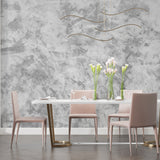 Grey marble effect wall mural in elegant dining room with natural lighting