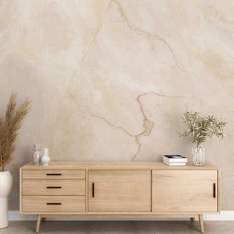 Marble effect wallpaper in modern living room showing beige stone pattern with natural veining