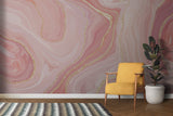 Dining room showcasing abstract marble wallpaper with soft pink and golden swirls