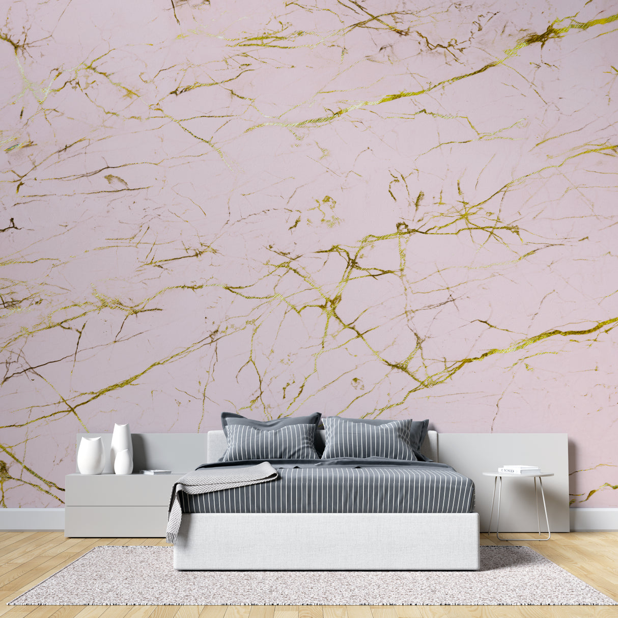 Master bedroom with pink and gold marble accent wall creating a luxurious atmosphere