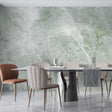Green marble wallpaper creating luxury atmosphere in modern living room with natural light