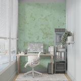 Home office with textured green marble wallpaper showing subtle pattern detail