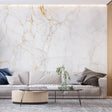 White and gold marble wallpaper in modern living room creating bright, open atmosphere