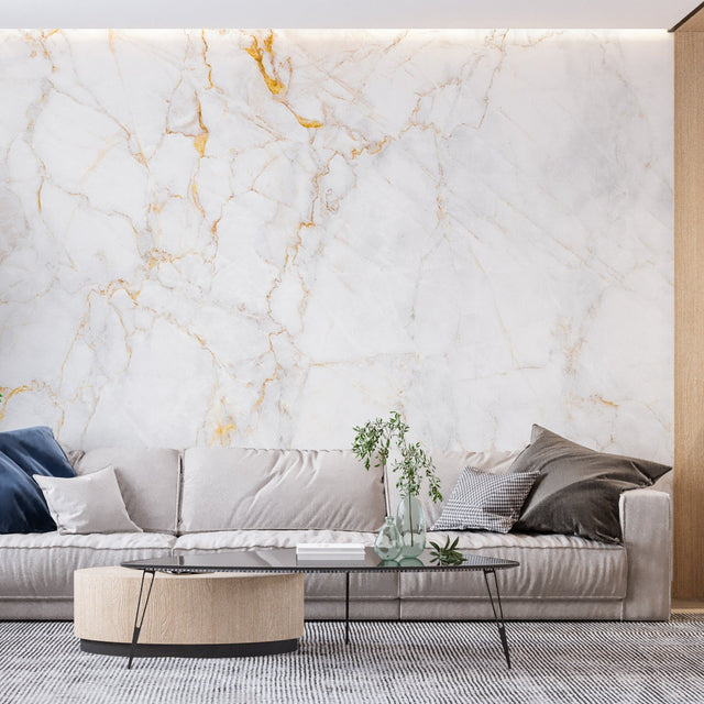 White and gold marble wallpaper in modern living room creating bright, open atmosphere