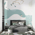 Marine animals wallpaper showcased in a bright nursery with white furniture and natural light