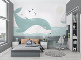 Whale and seabirds wallpaper bringing life to a minimal Scandinavian kid's room