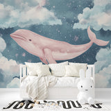 Pink whale wall mural displayed in a coastal-themed bedroom