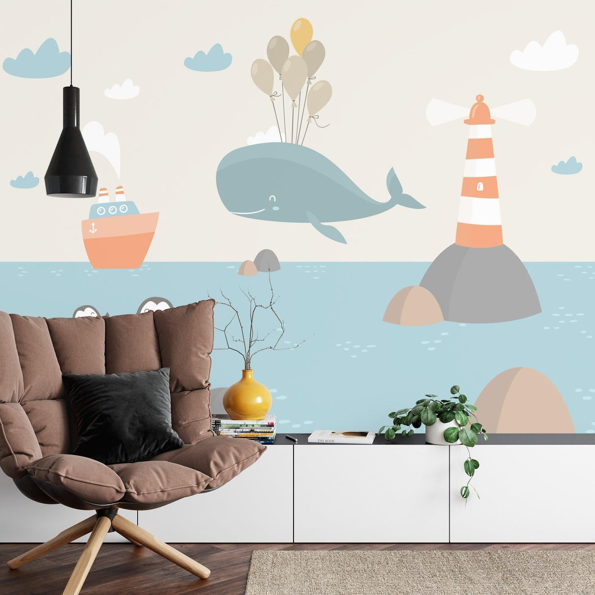 Nautical theme wallpaper bringing ocean vibes to a modern nursery with gentle blue whale and lighthouse