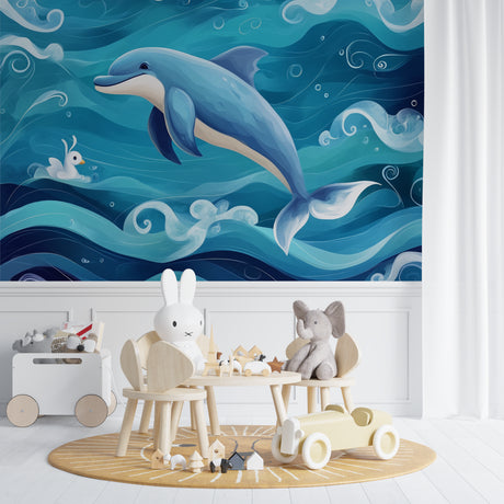 Dolphin wall mural bringing ocean magic to a bright kids bedroom with blue accents and matching decor
