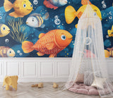 Marine fish wallpaper in bright kids bedroom showing colorful fish swimming against deep blue background
