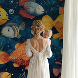 Ocean themed wall mural in playroom showing detailed fish and bubbles