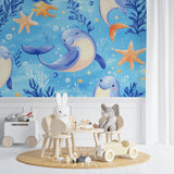 Sea life wallpaper adding charm to a coastal-style children's room