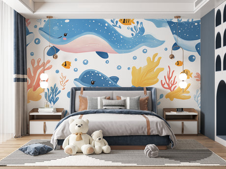 Marine animals wallpaper in bright kids bedroom showing playful whales and coral design